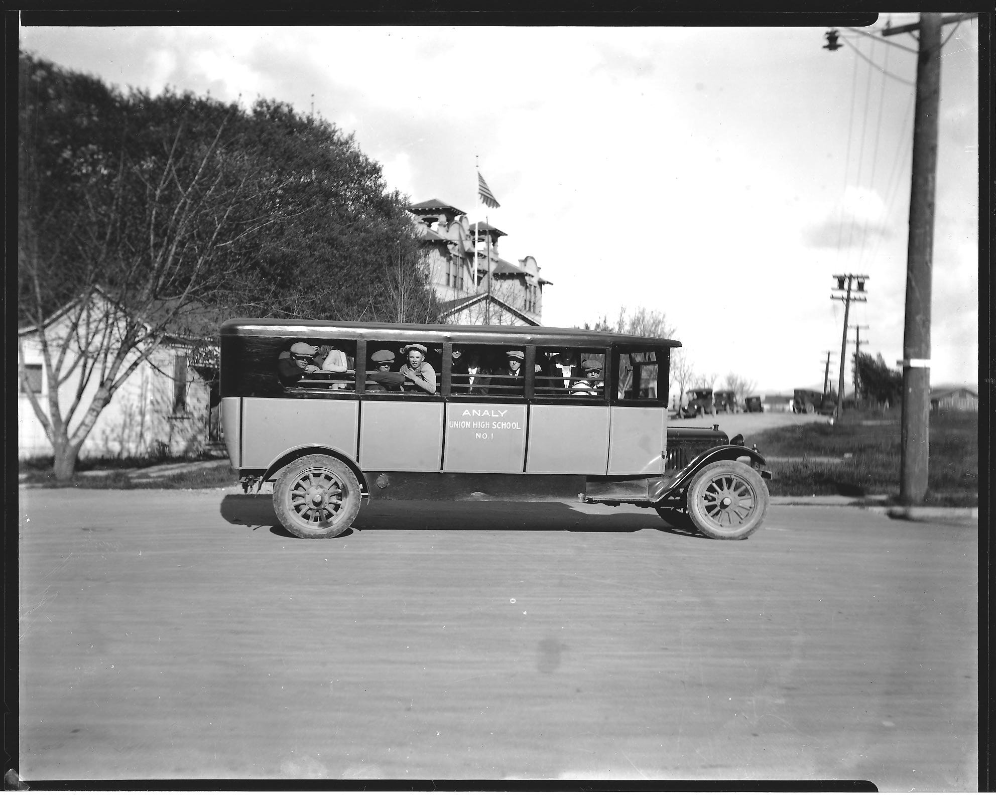 Analy High School Bus No. 1 parked in front of the Analy High School with students on board. Circ. 1920’s