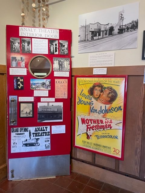 An Analy Theater interior door is adorned with its history.